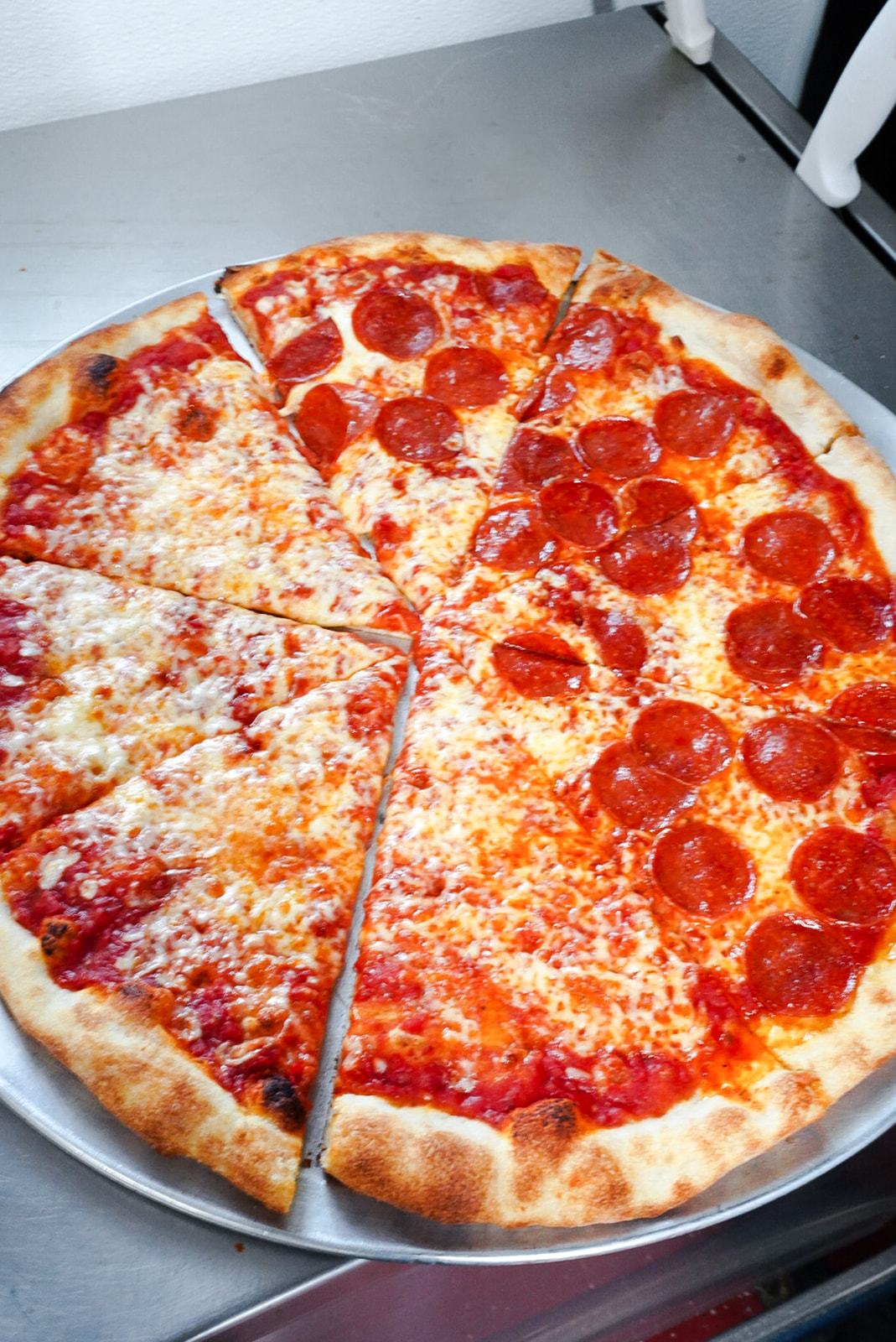 half plain half pepperoni pizza